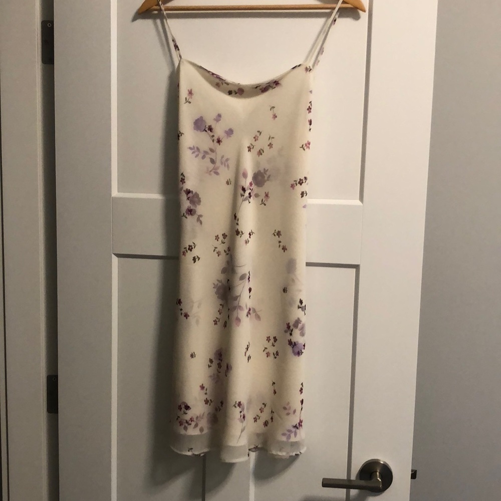 Floral print dress. ALYN PAIGE, size 7/8, off white with purple floral detailing